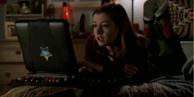 Willow from TV Show Buffy the Vampire Slayer, looking at a computer
